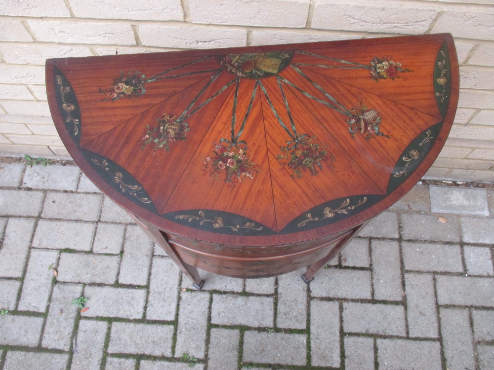 An Edwardian painted satinwood demi-lune cabinet, decorated with floral swags to the hinged top - Image 2 of 2