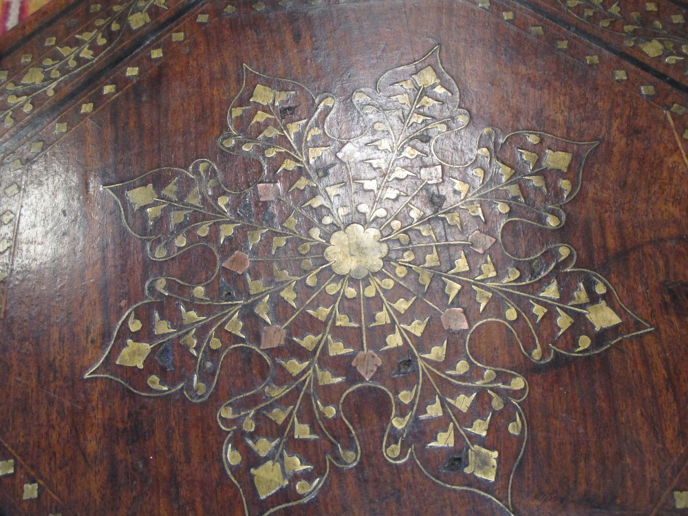 Three early 20th century Indian brass inlaid octagonal occasional tables on folding stands, - Image 4 of 4