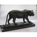 A Japanese style bronze figure of a tiger on marble base 46cm long overall