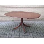 A 19th century mahogany breakfast table