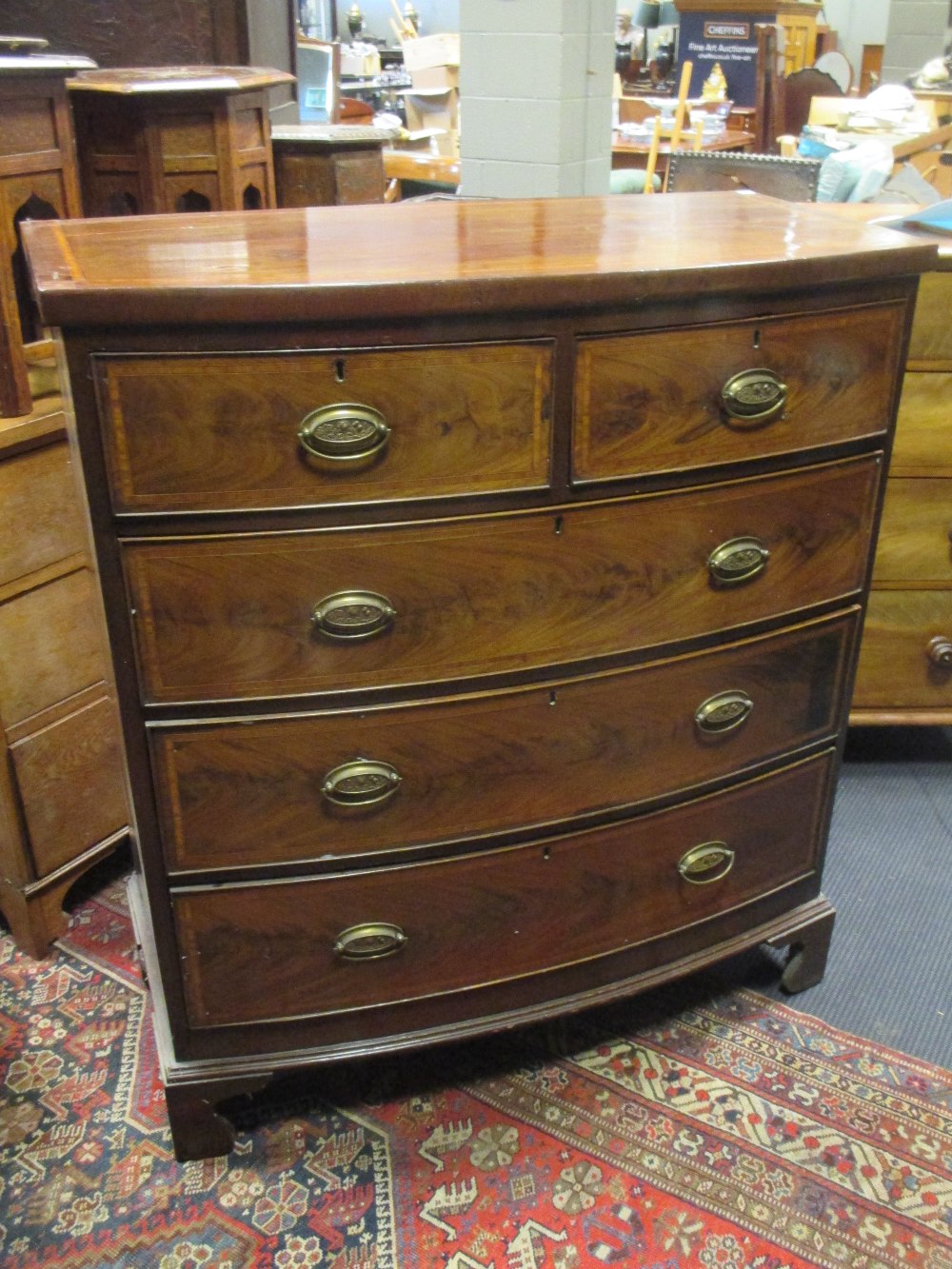 A Regency mahogany bowfront chest of drawers, 117cm high, 103cm wide