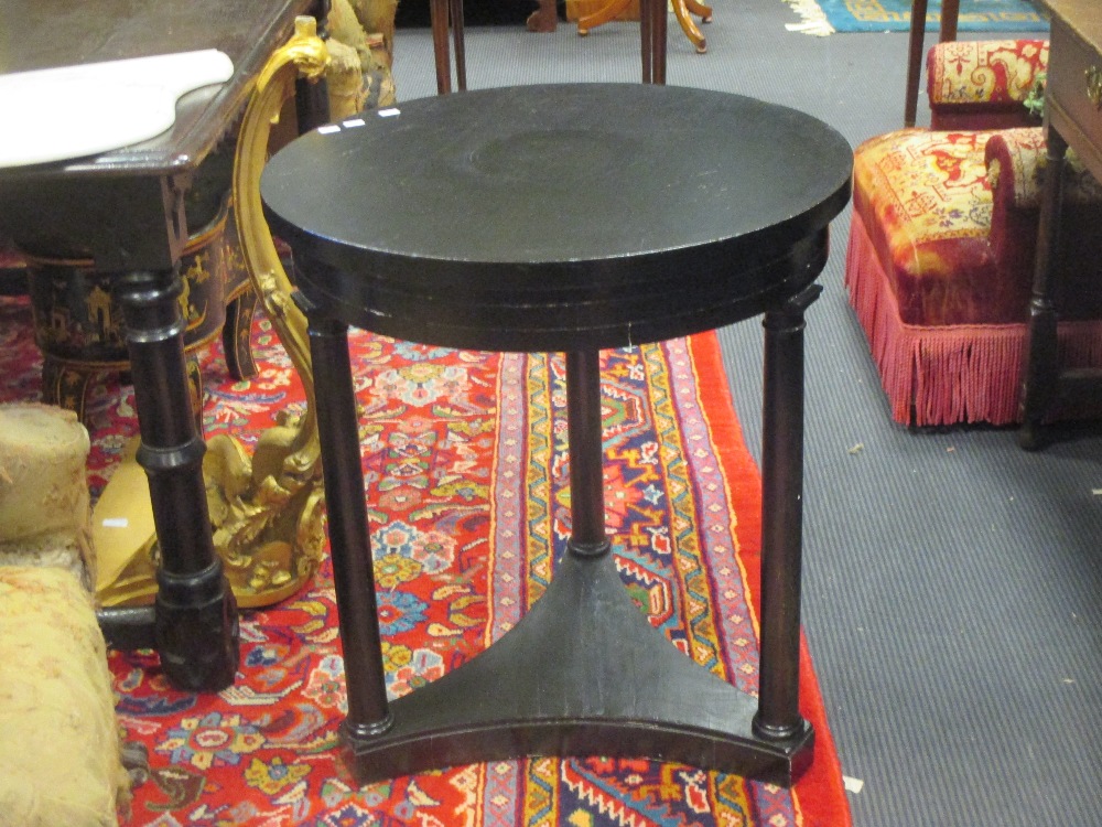 A 19th century French black painted circular occasional table, 66cm diameter, together with