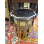An Indian ebonised and inlaid occasional table 42cm wide