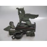 Various ancient bronze axes, an oil lamp and other items