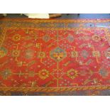 An Ushak carpet, (worn, some damage) 350 x 240cm