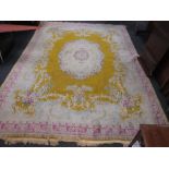 A modern mustard ground rug approx 390 x 261cm