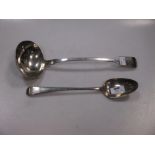 A George III silver basting spoon by Peter & William Bateman, together with a George IV silver