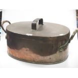 A 19th century copper lidded cooking pan