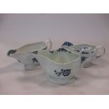 A Lowestoft porcelain blue and white cream jug together with two other Lowestoft cream jugs (3)