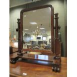 A William IV mahogany swing mirror