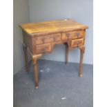 An 18th century walnut lowboy 71 x 73 x 47cm