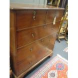 A George III red walnut chest of drawers - alterations