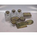 Asprey - A Victorian silver ten piece lady's toilet set, with cut glass bodies and gilded covers,
