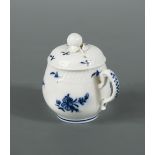 A Tournai blue and white baluster custard cup and cover, circa 1780, decorated with floral sprays