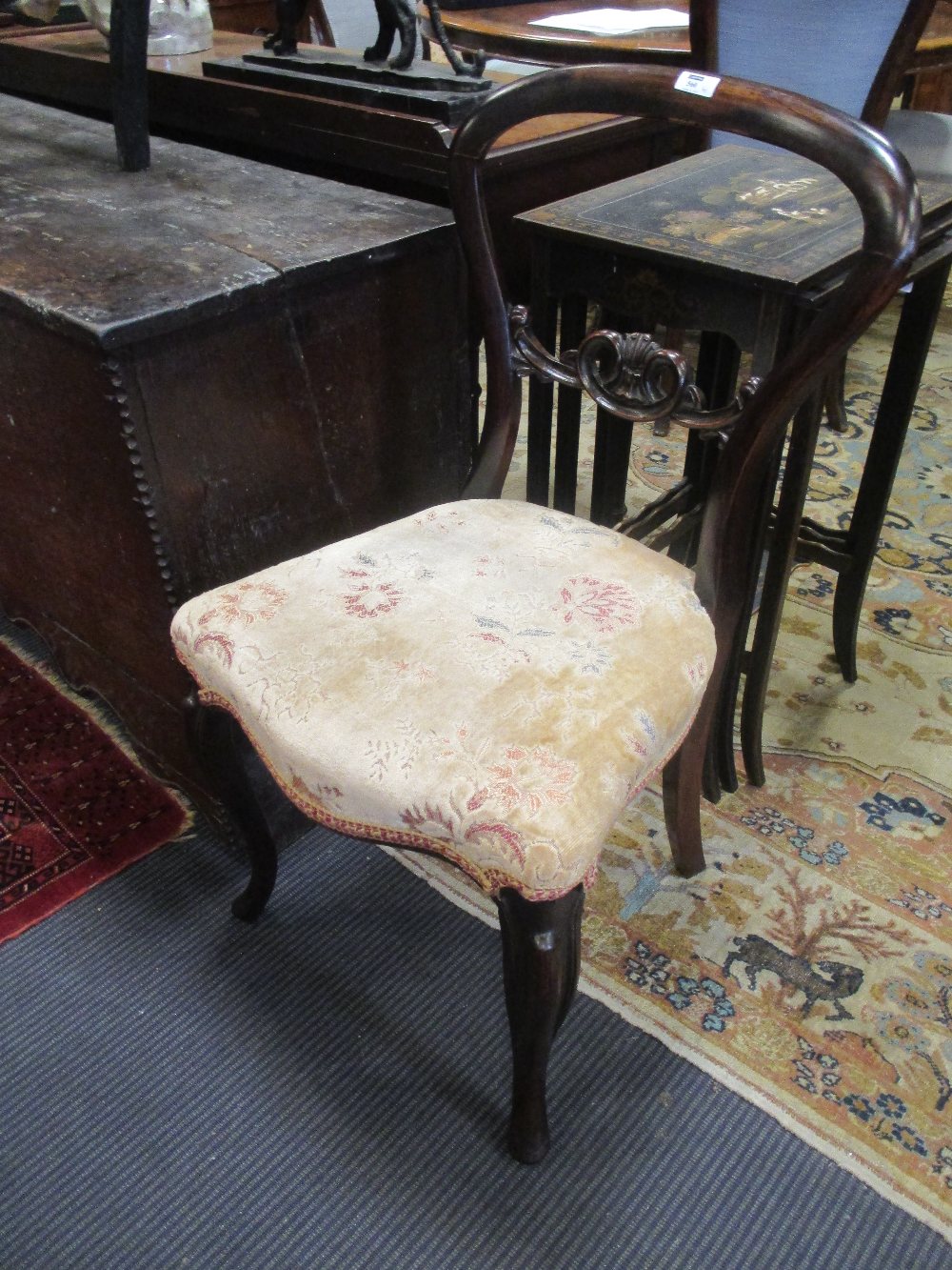 A pair of Victorian rosewood balloon back dining chairs (2)