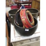 A Chinese bowl gong with beater on a red lacquered stand (A/F) and two oriental brass tins with