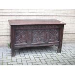 A late 17th century panelled oak coffer 78 x 129 x 57cm