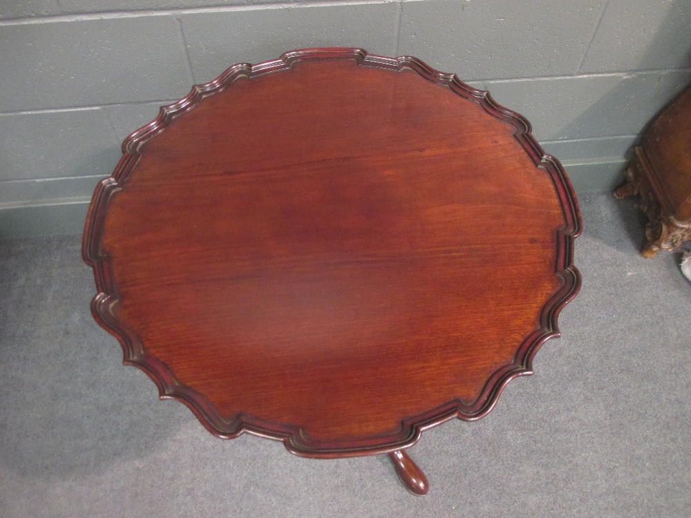 An 18th century mahogany pie crust tilt top tripod table - Image 3 of 5