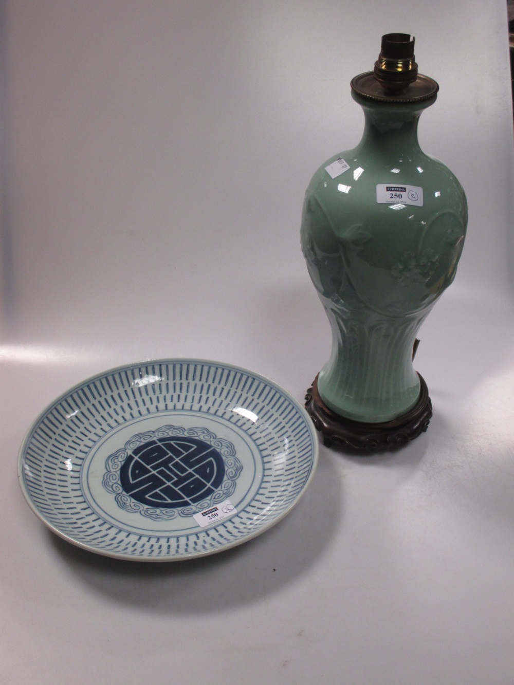 A 19th century Chinese dish and a celadon lamp