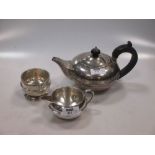 A silver teapot together with a silver milk jug and sugar bowl, 23.9ozt gross (3)