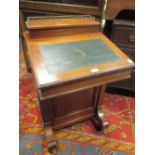 A late Victorian walnut Davenport desk