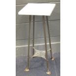 An Art Nouveau brass stand with marble top