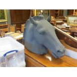 A black painted plaster life-size model head of a horse, from the Elgin marbles
