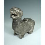 A Five Dynasties grey pottery figure of a lion, it stands on short legs with raised head and open