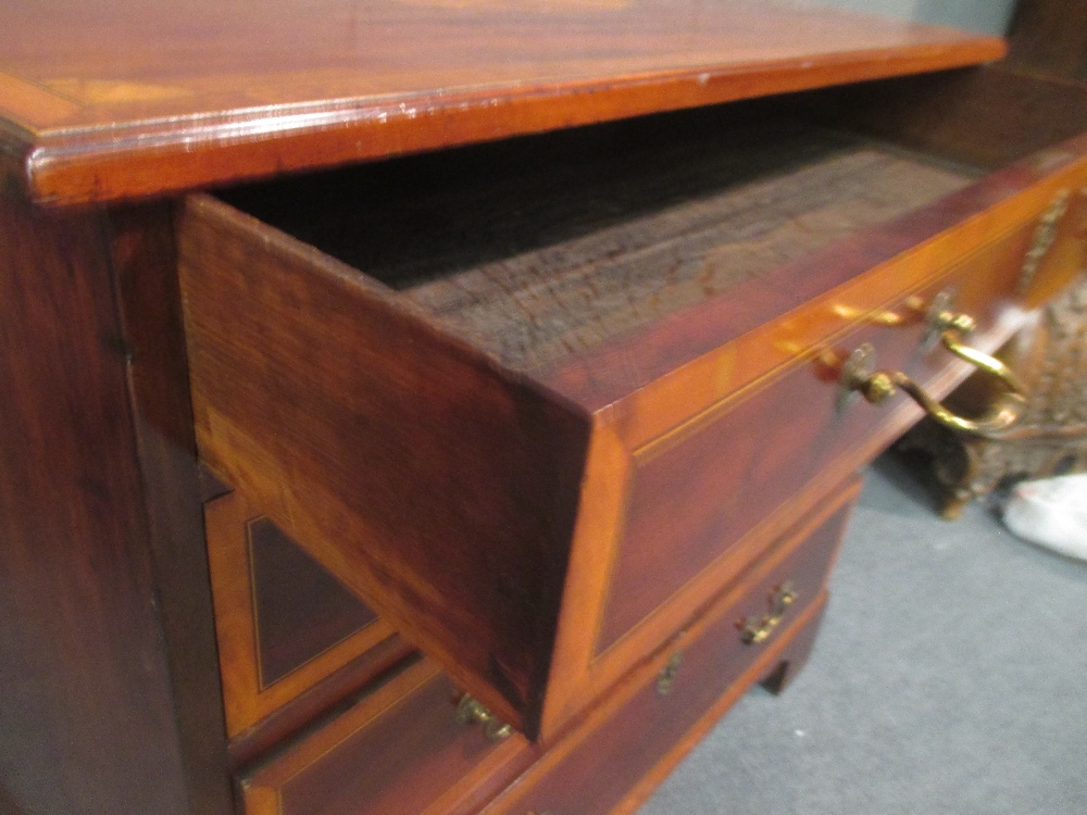 A George III mahogany and crossbanded chest of four long graduating drawers on bracket feet 79 x - Image 3 of 3