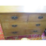 An Art Nouveau ash chest of drawers 122cm wide