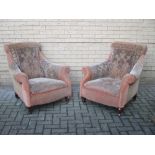 A pair of late Victorian deep armchairs (2)