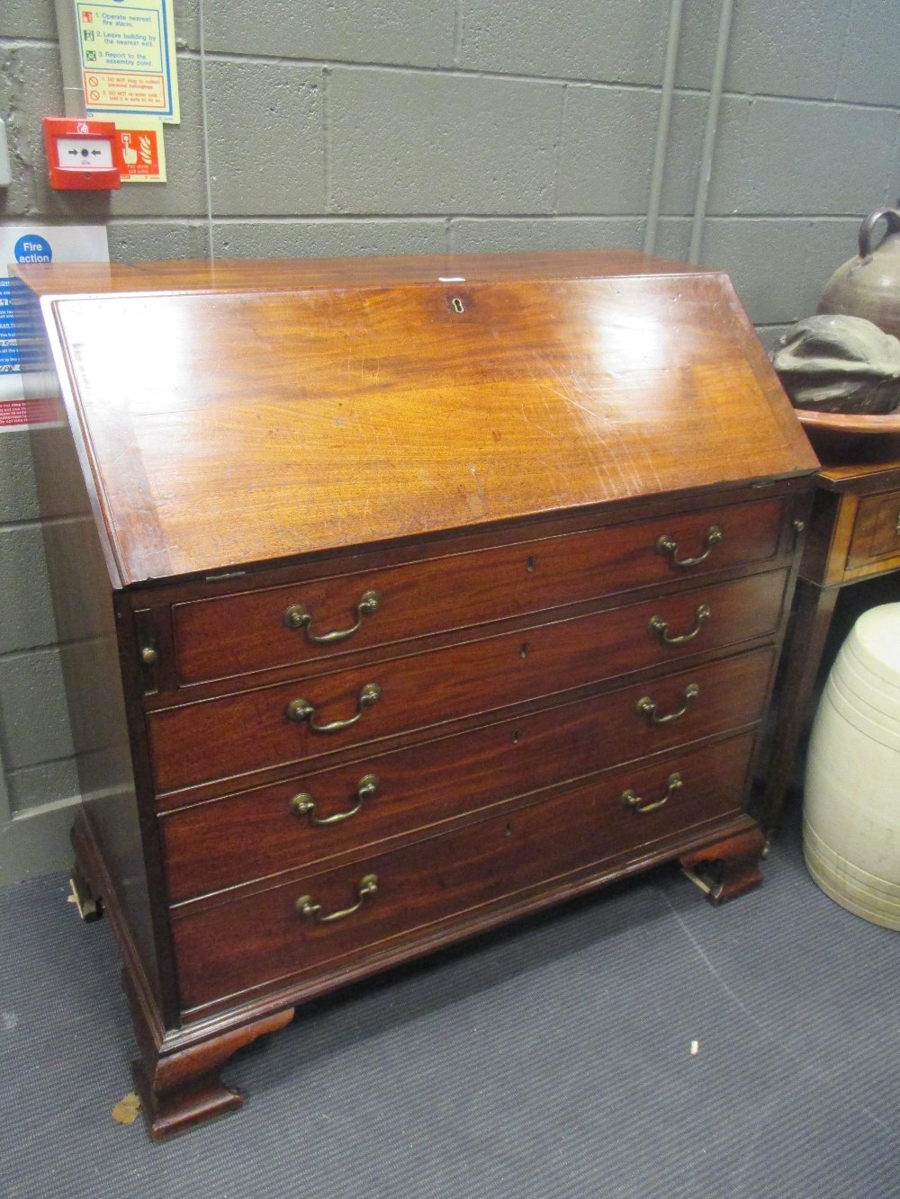 A George III mahogany bureau with fitted interior, 108cm wide