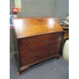 A George III mahogany bureau with fitted interior, 108cm wide