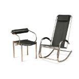 A 20th century black vinyl and chrome elbow chair, with cylindrical cushions, together with a