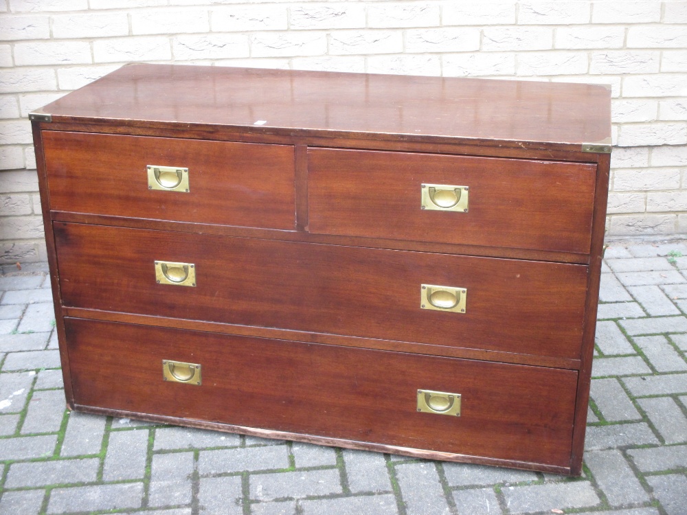 A military type low chest of drawers with flush handles