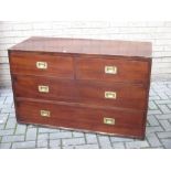 A military type low chest of drawers with flush handles