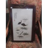 A set of four Chinese early 20th century large framed ceramic plaques, decorated with fish, 62 x