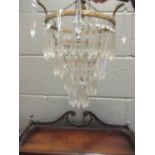 A pair of 1930's four tier small glass chandeliers