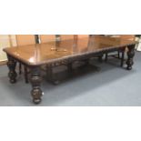 A good quality late-Victorian oak extending table, with four leaf insertions. 360 cms long when