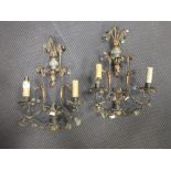 A pair of early 20th centuiry wall lights with glass droplets