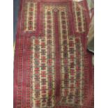 Five tribal rugs including a Belouchi prayer rug, and a Causcasian rug (5)