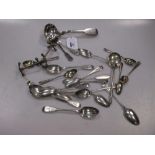 A collection of silver flatware, together with a silver plated spoon and a pair of silver plated