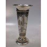 An Edward VII silver trumpet vase with pierced decoration, by, London, 1907