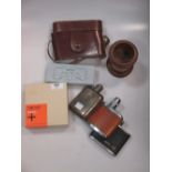 A Silver hip flask (worn) 3.15ozt, 2 other flasks, camera and treen pot etc