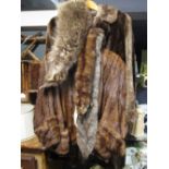 A mid-20th century lady's brown fur jacket, a lady's fur coat, fox stoles etc (5)