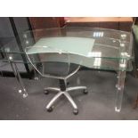 A contemporary glass topped desk on acrylic cylindrical legs, together with a plexiglass swivel