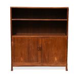 A Cotswold School walnut cabinet, the rectangular top with re-entrant corners above single