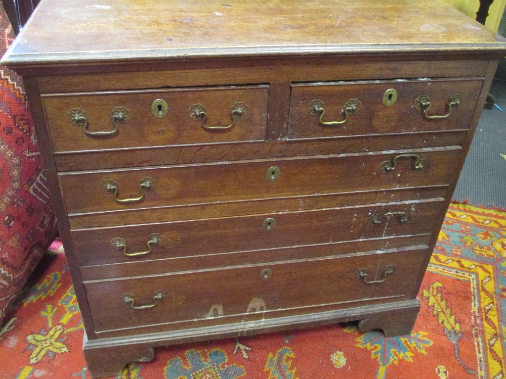 An 18th century oak chest of drawers, 91cm high, 95cm wide