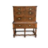 An 18th century oyster veneer chest on stand,