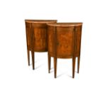 A small pair of French kingwood demi-lune commodes,